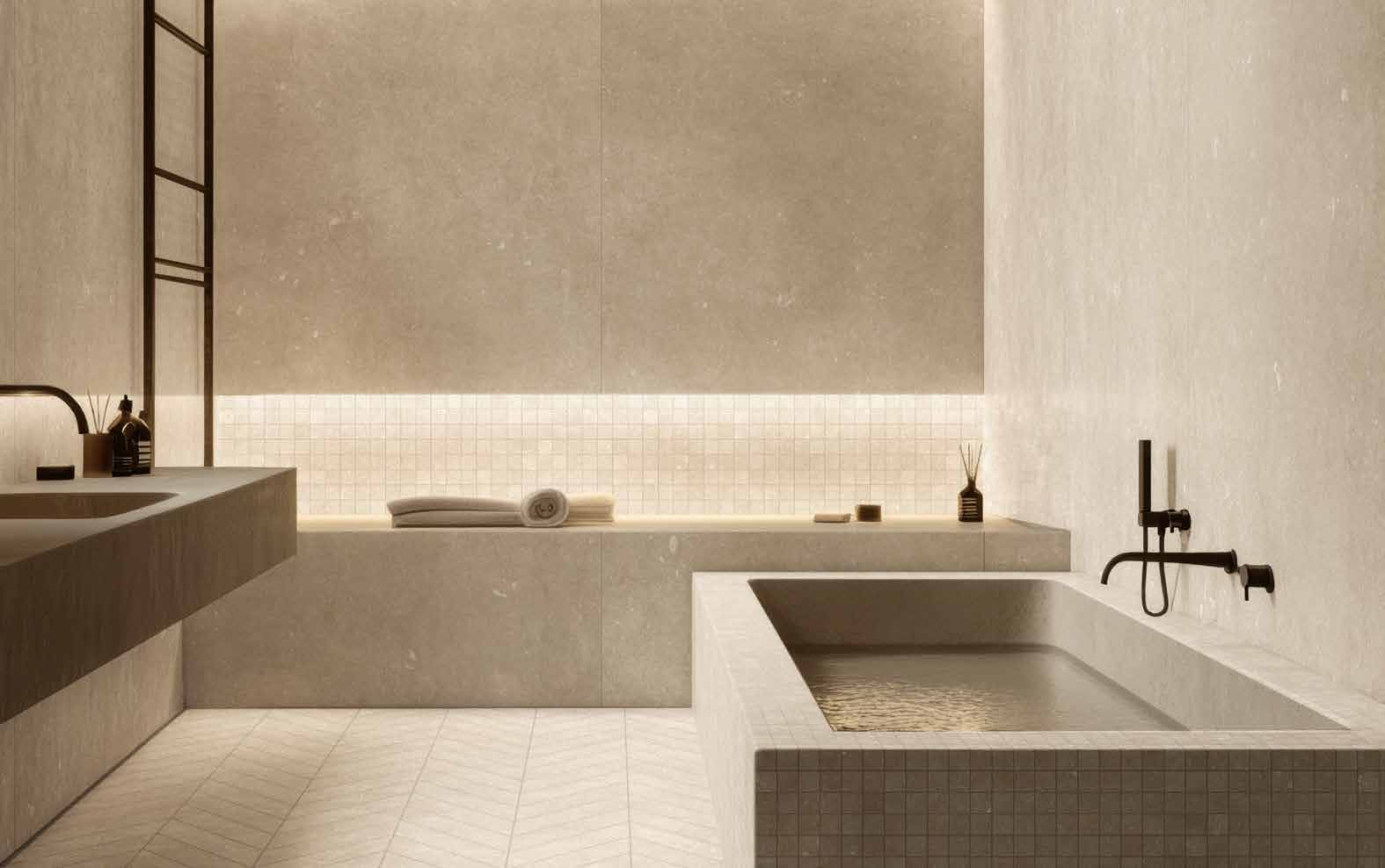 Sandstone Beige · silky wall, mosaic bath and matt chevron floor